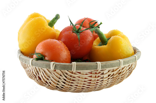 Fresh tomatoes and pepper in the basket