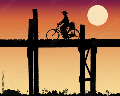silhouette crossing the bridge