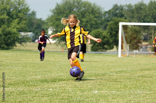 Young Soccer Player Prepares to Kick