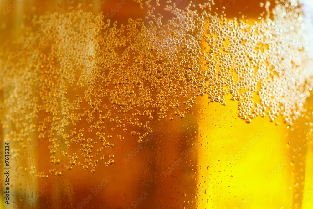 Glass of beer with bubbles