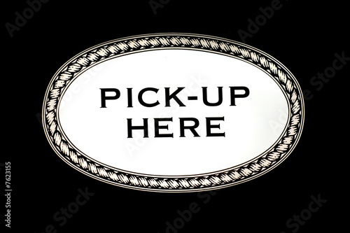 Pick-up here sign on isolated black background