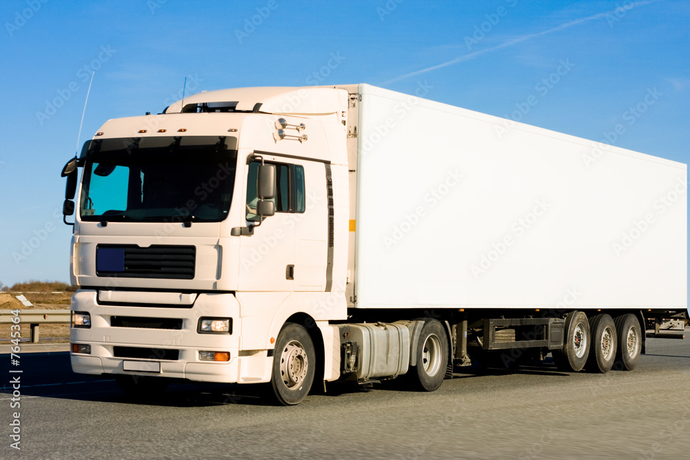 blank clean truck on blue clouded sky background