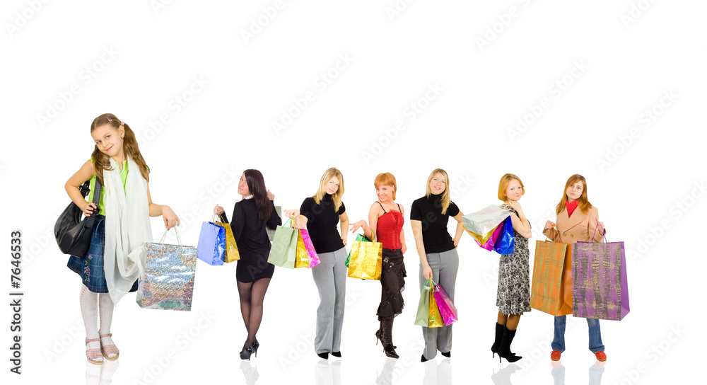 group of shoppers with little girl at front group of shoppers with little girl at front