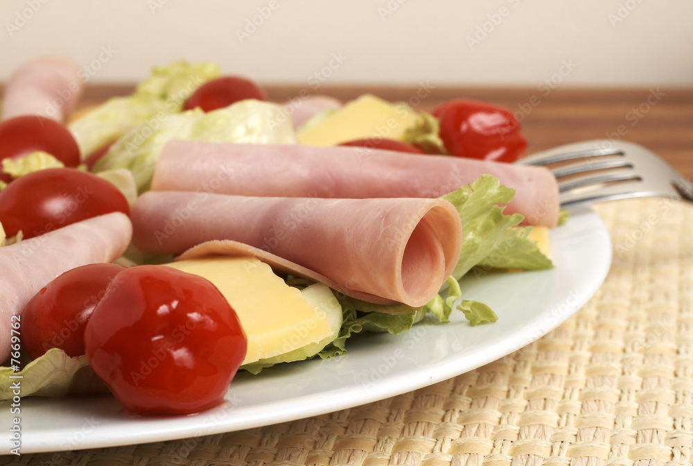 Fresh salad with cold meat, greens and peppers Fresh salad with cold meat, greens and peppers