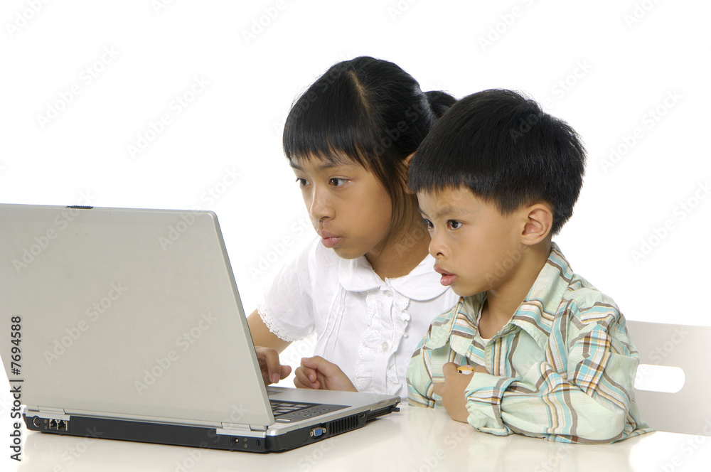 kids playing computer games or learning online kids playing computer games or learning online