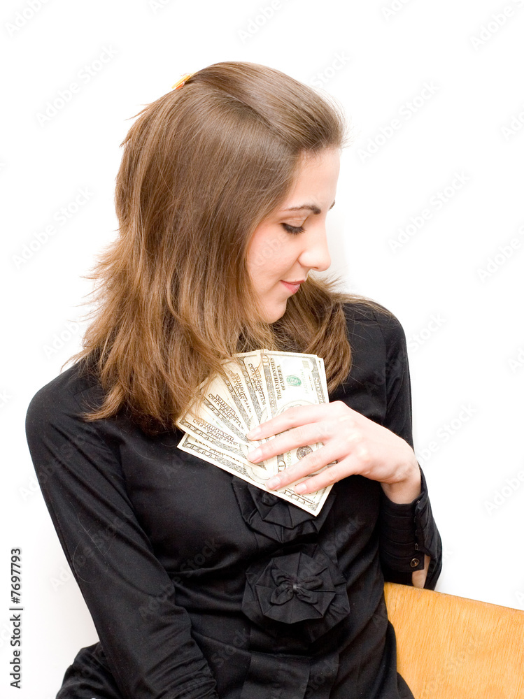 Beautiful business woman holding money and smiling Beautiful business woman holding money and smiling