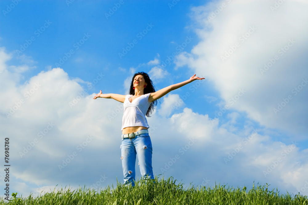 happy young woman dreams to fly on winds happy young woman dreams to fly on winds