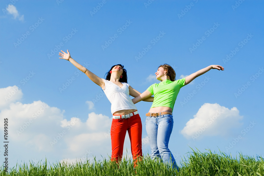 two happy young women dreams to fly two happy young women dreams to fly