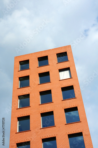 Orange building against sky