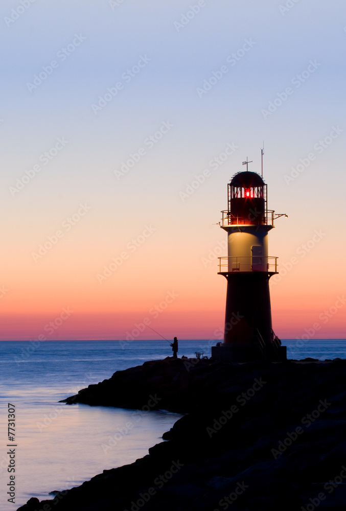 lighthouse after sunset