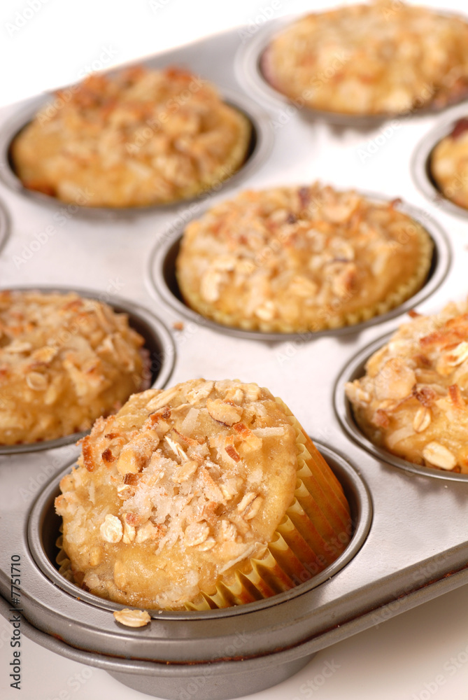 Freshly baked tropical pineapple muffins with nuts Freshly baked tropical pineapple muffins with nuts