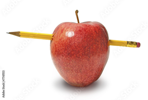 Apple with a Pencil Stuck Through It on White