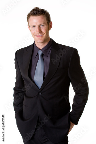 caucasian man smilling wears formal business attire