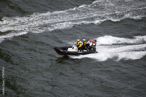 police speedboat chasing another boat