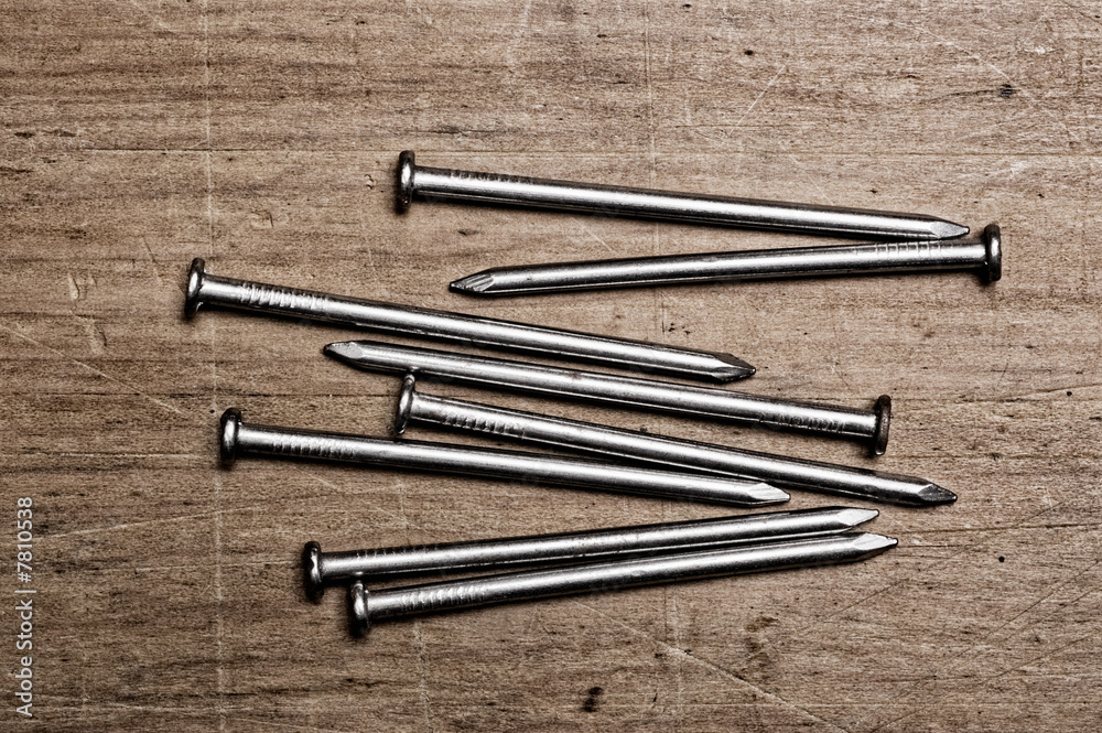 nails on wooden table.