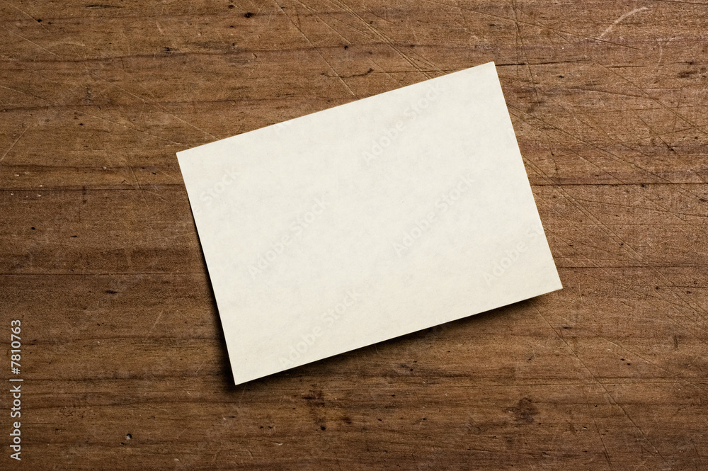 Note paper on wooden background. Note paper on wooden background.