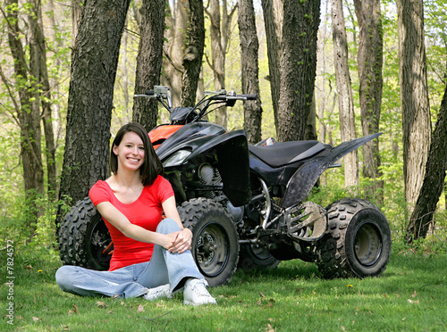 woman sitting with ATV