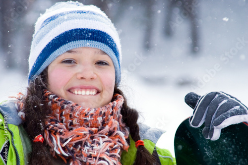Laughing beautiful girl snowboarder, snowfall (series Sport, Ext