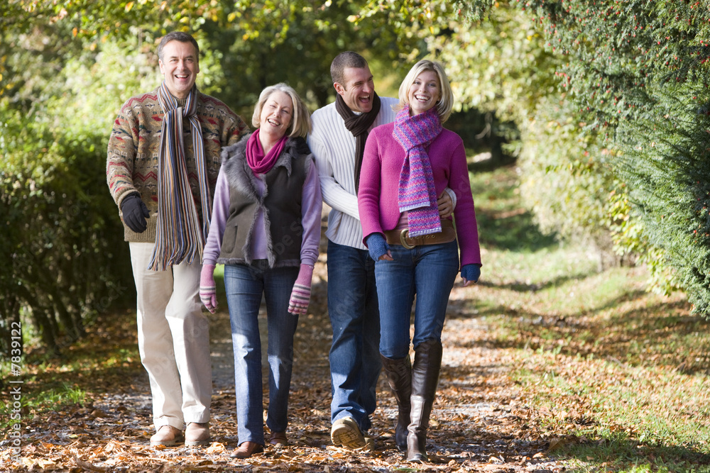 Parents and grown up children on walk
