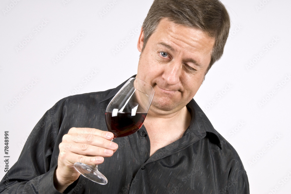 Man Holding a Glass of Red Wine Man Holding a Glass of Red Wine