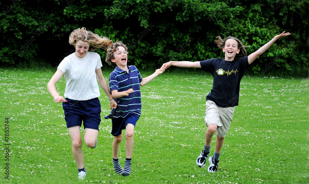 children running in the park children running in the park