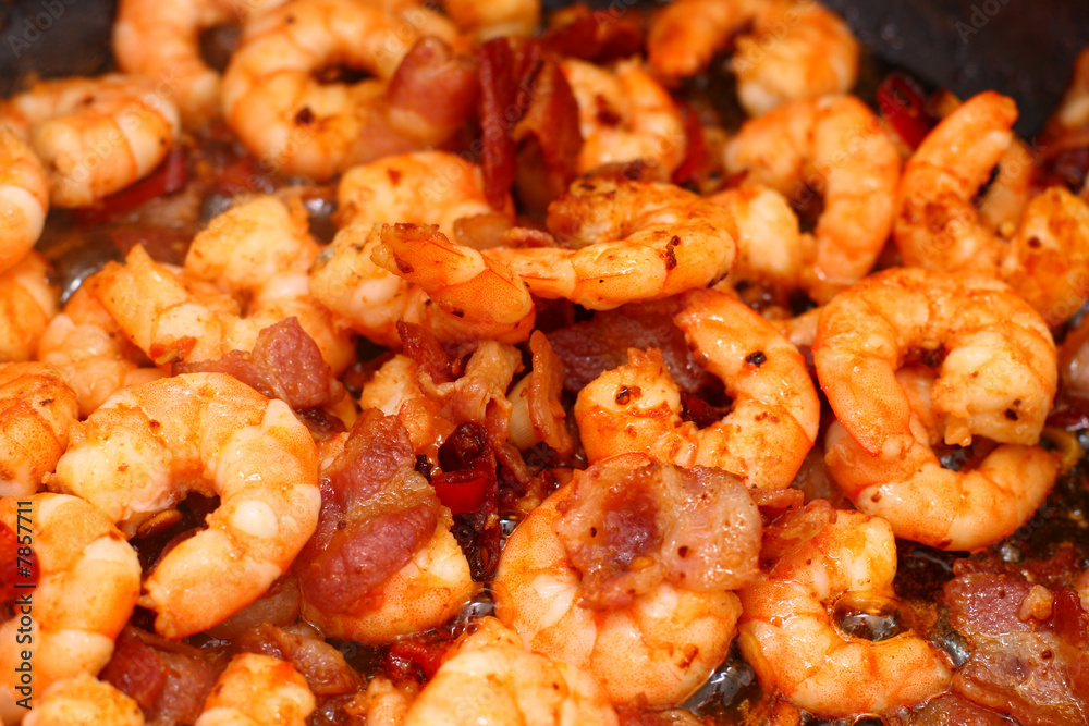 Chili shrimps with bacon, garlic, spices and lemon grass Chili shrimps with bacon, garlic, spices and lemon grass