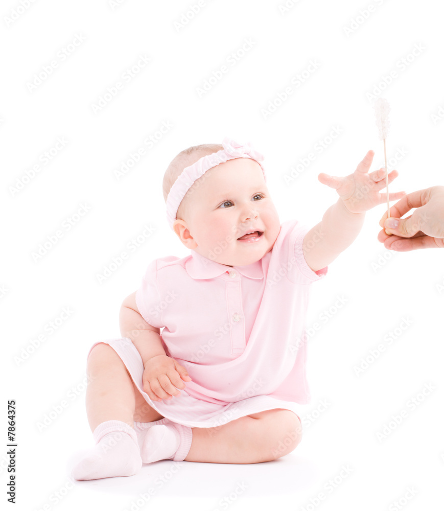 Sweet happy little girl take candy on stick Sweet happy little girl take candy on stick