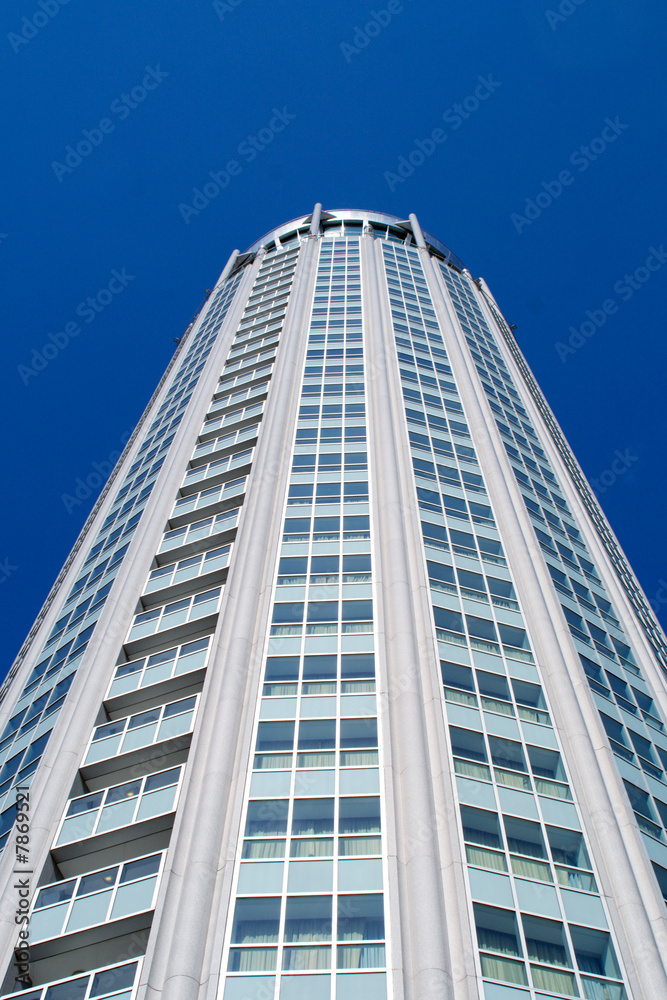 High modern building on background blue sky. Moscow, Russia.