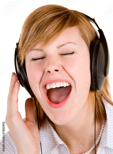 Obraz na plátně Listening to Music with Headphones
