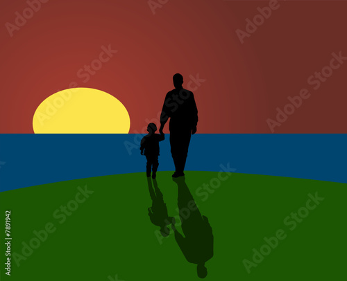 Father and son looking at sunset