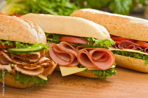 Ham sandwich, turkey sandwich and salami sandwich