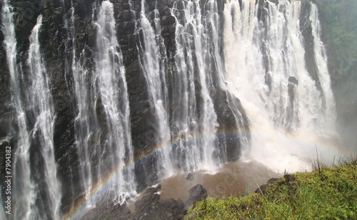 Victoria falls with colorful rainbow