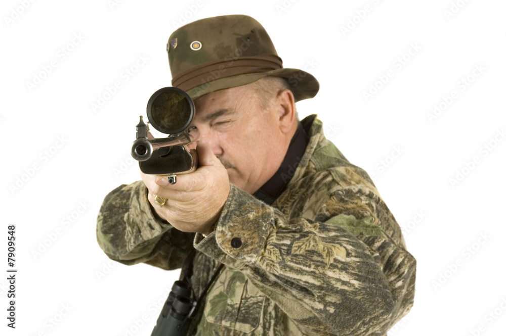 Hunter with telescopic sights on rifle