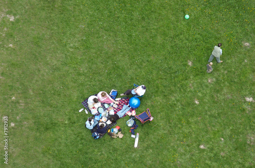 Leaving the picnic - overhead shot of a family group