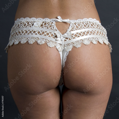 Obraz na płótnie Fesses d'une jeune femme w salonie