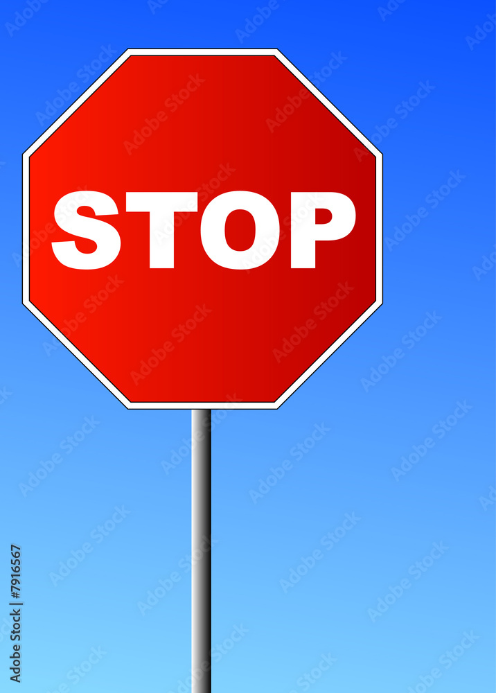 red stop sign against brilliant blue sky red stop sign against brilliant blue sky