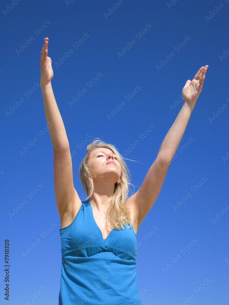 Attractive woman on the blue sky Attractive woman on the blue sky
