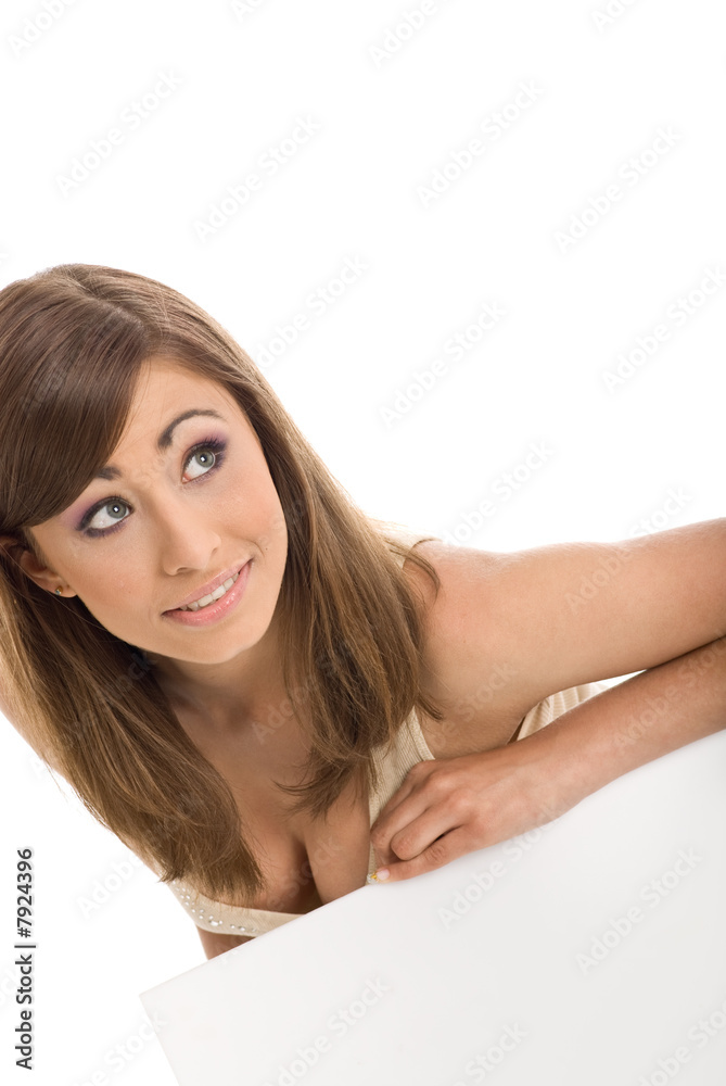 Fototapeta premium beautiful girl holding white billboard for you text