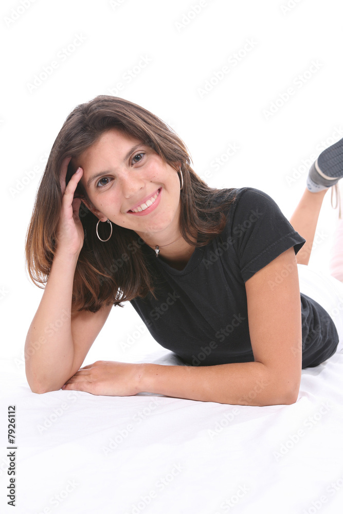 Naklejka premium Smiling Teen on Floor