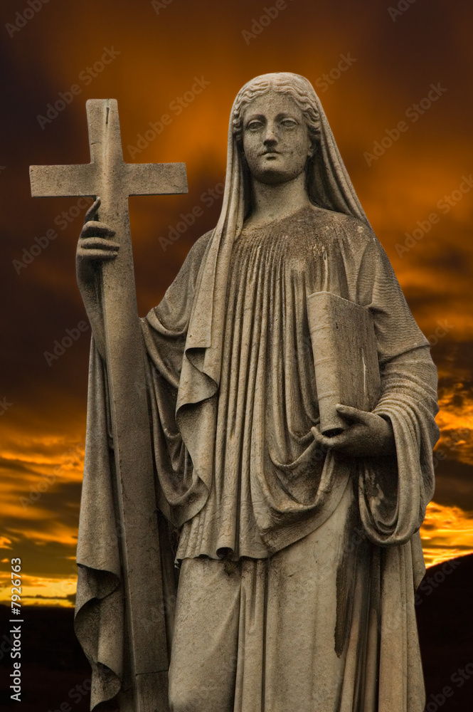 Fototapeta premium Religious statue at dusk.