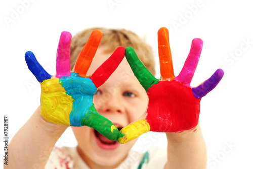 Happy child with painted hands