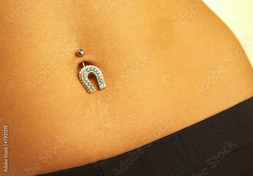 female navel with piercing