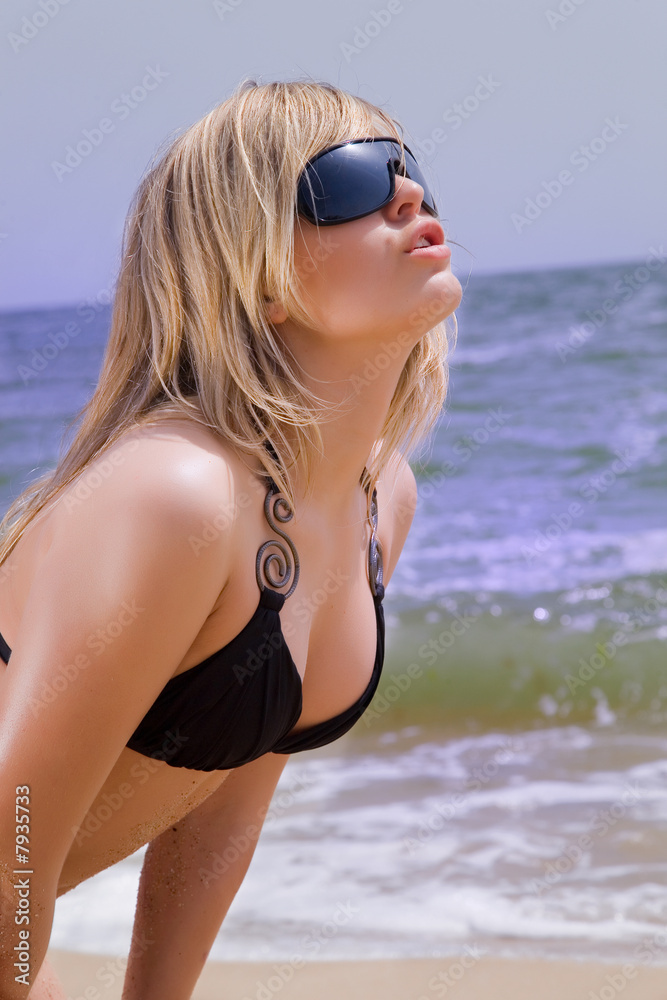 Portrait of a beautiful girl on the beach Portrait of a beautiful girl on the beach