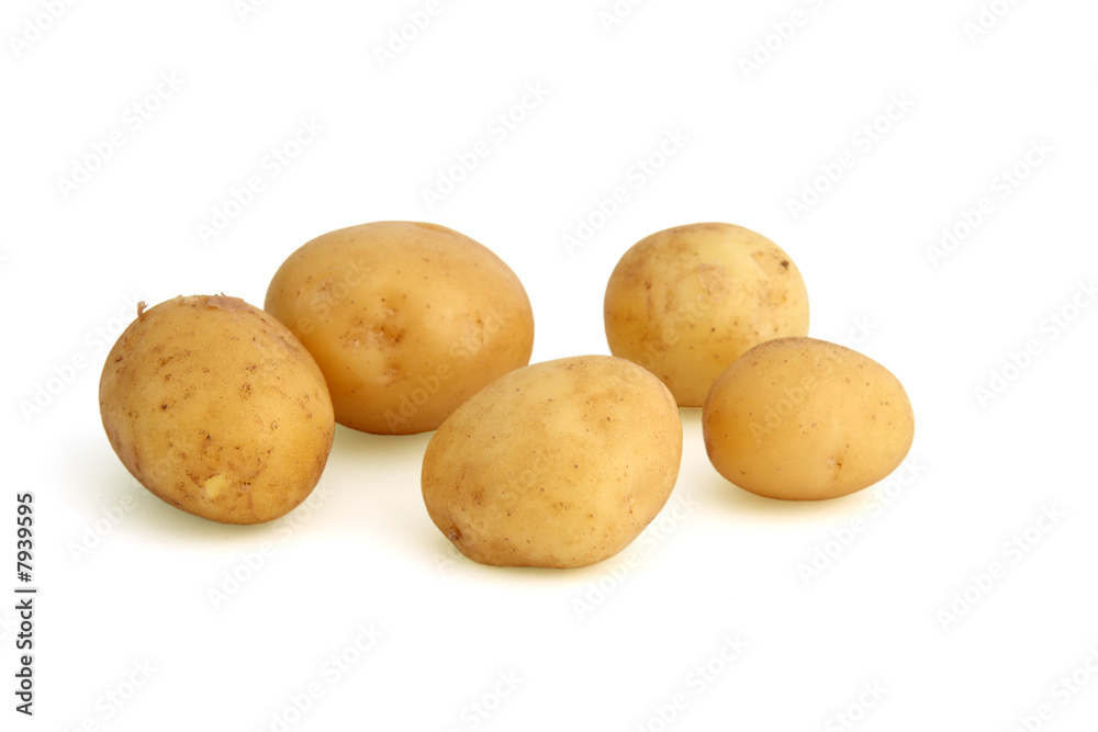 Fresh potatoes with skin, isolated on white background Fresh potatoes with skin, isolated on white background