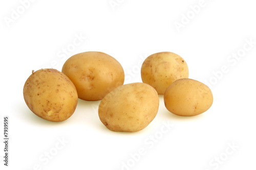 Fresh potatoes with skin, isolated on white background