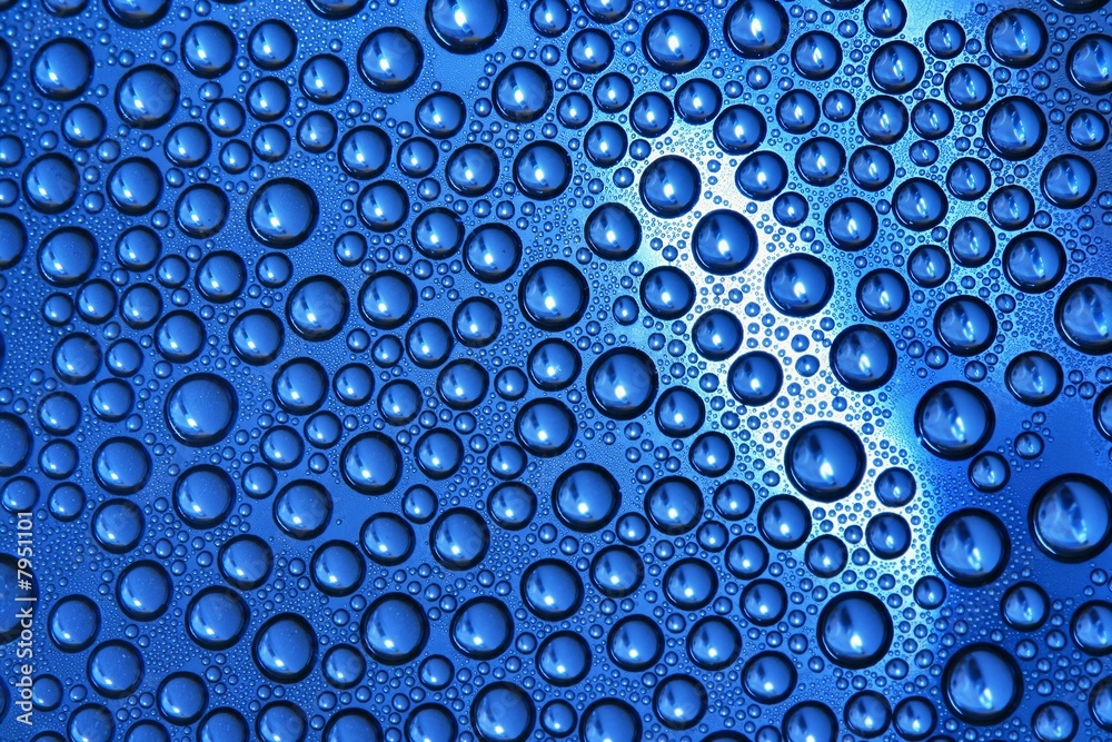 Water droplets on colored background