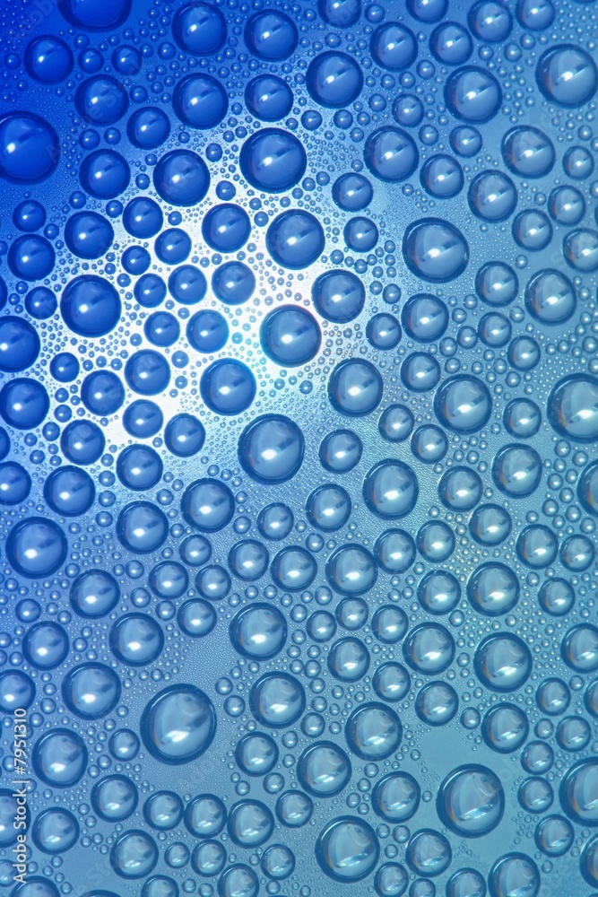 Water droplets on blue background Water droplets on blue background