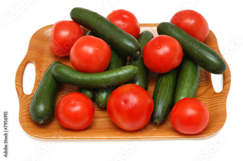 Cucumbers and tomatoes isolated on the white