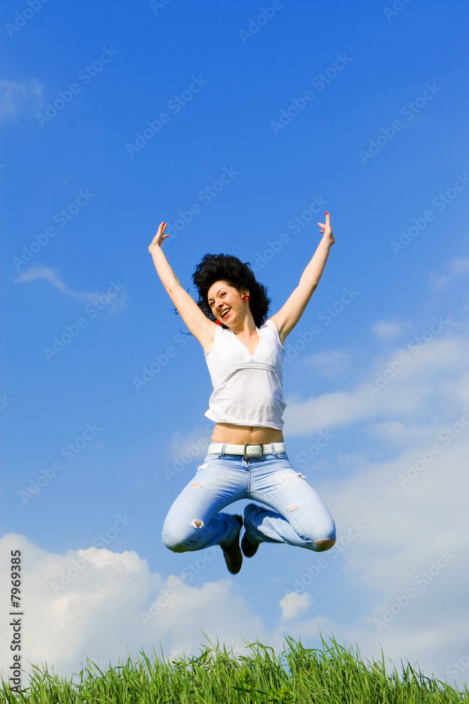 happy young woman is jumping happy young woman is jumping