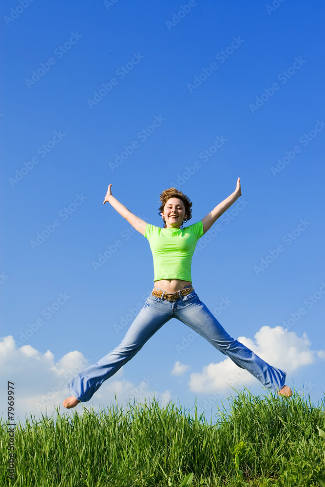 happy young woman is jumping happy young woman is jumping